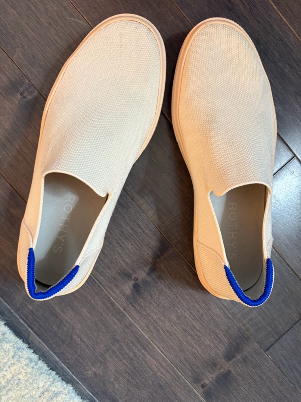 Rothy's Slip-On Sneakers in Cream with Blue Heel Loops